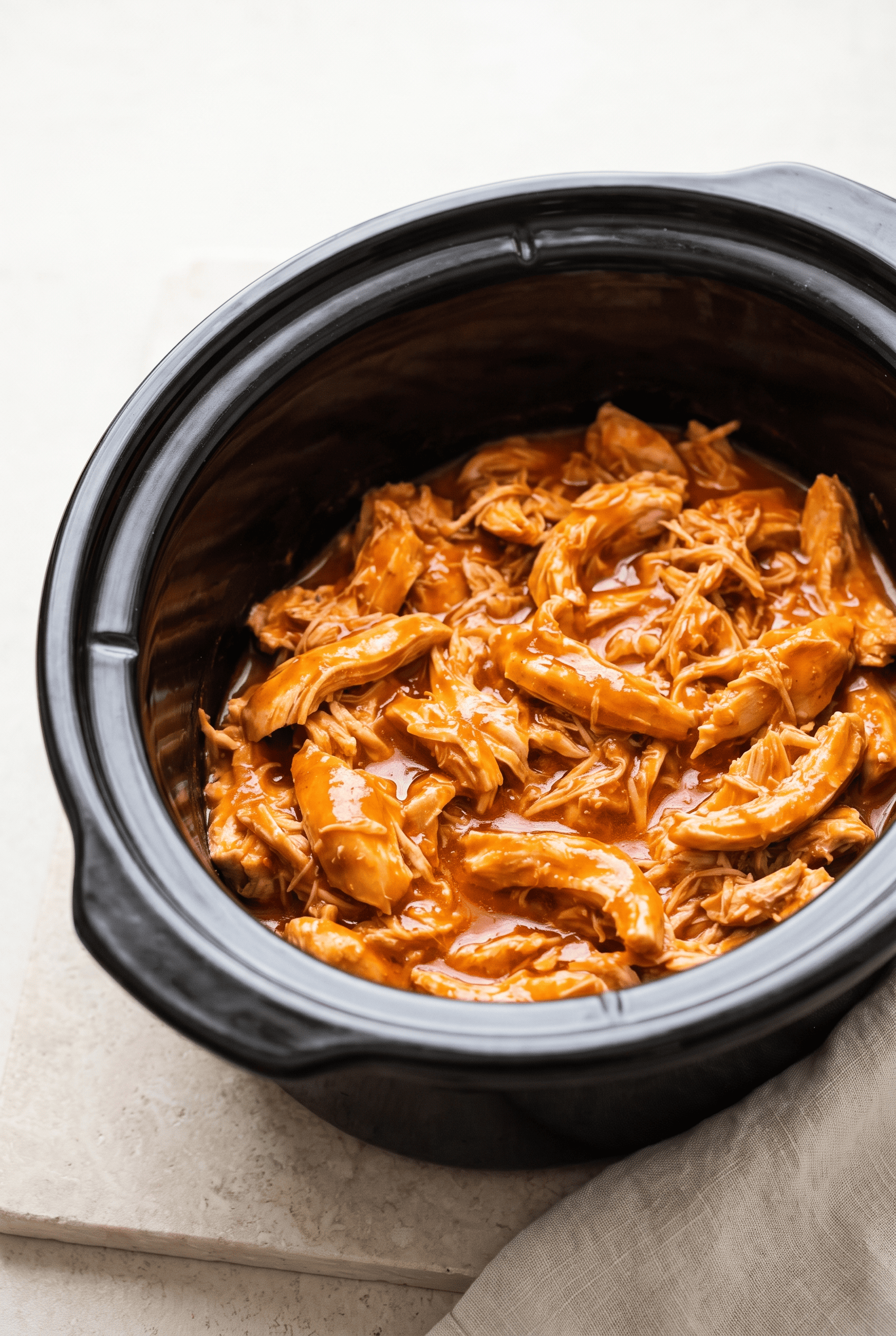 Crockpot buffalo chicken finished in the slow cooker
