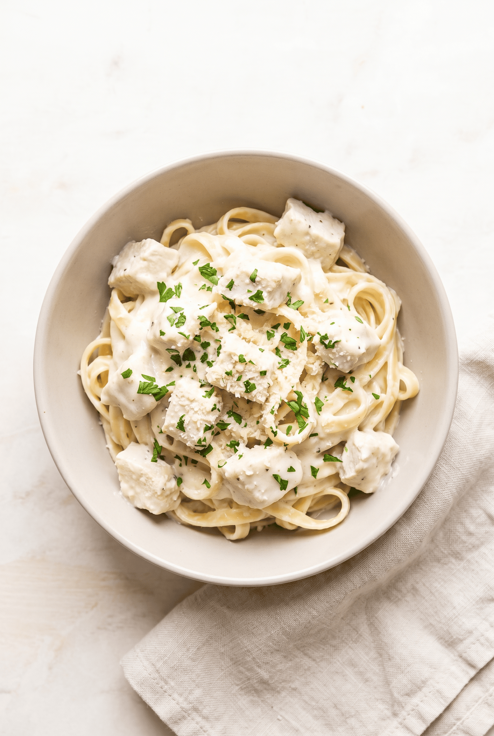 Overhead view of crockpot chicken alfredo