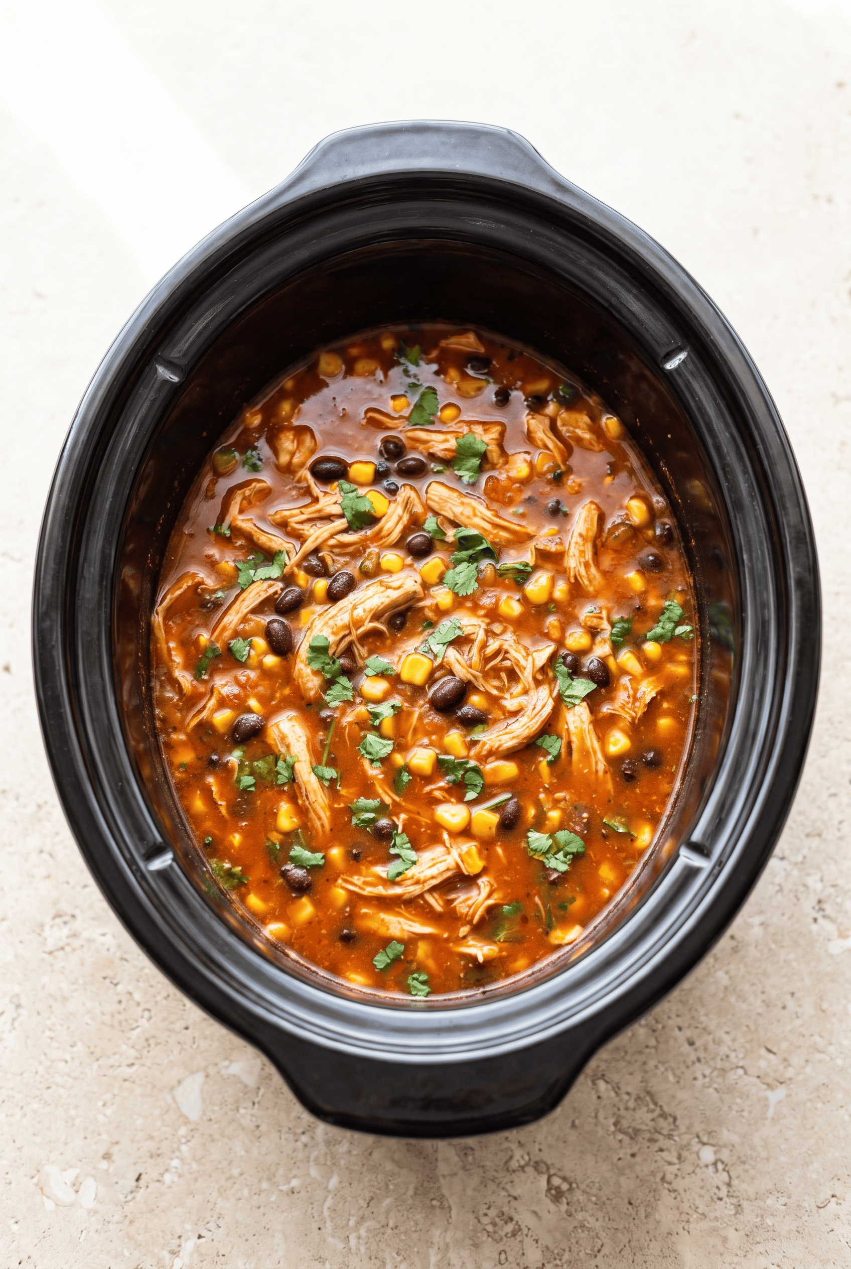 Crockpot Chicken Enchilada Soup finished in the slow cooker