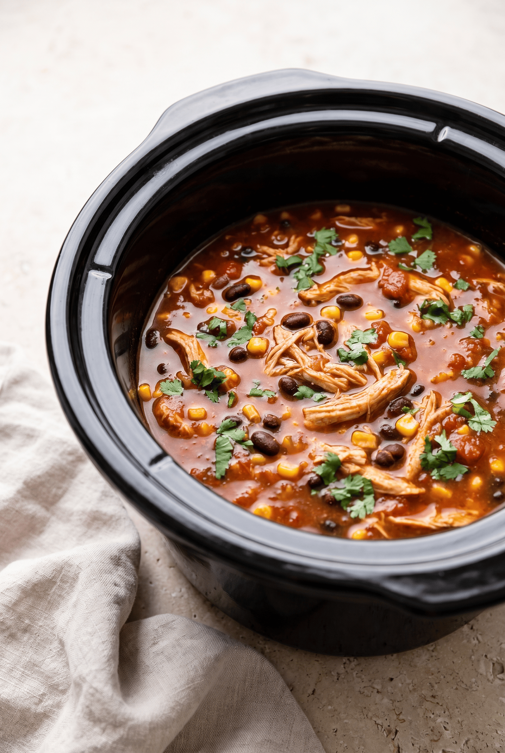 Crockpot chicken tortilla soup finished in the slow cooker