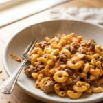 Homemade hamburger helper with elbow macaroni and ground beef in a creamy cheddar sauce
